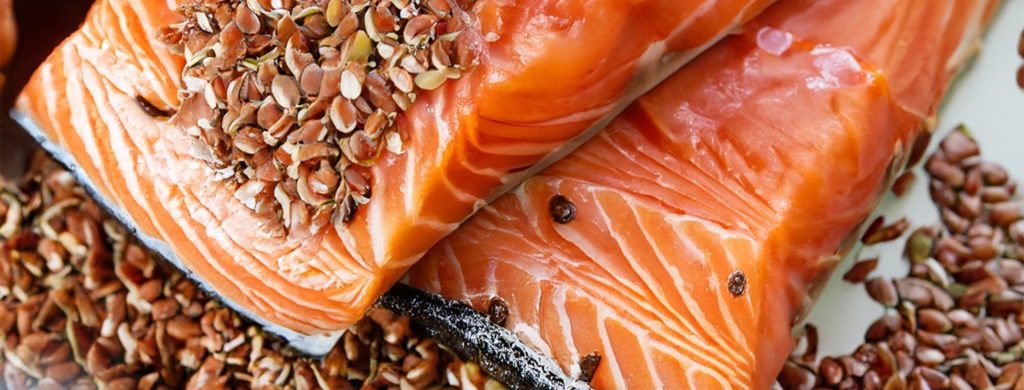 Walnuts, flaxseeds, and fatty fish (like salmon) are sources of omega-3 fatty acids